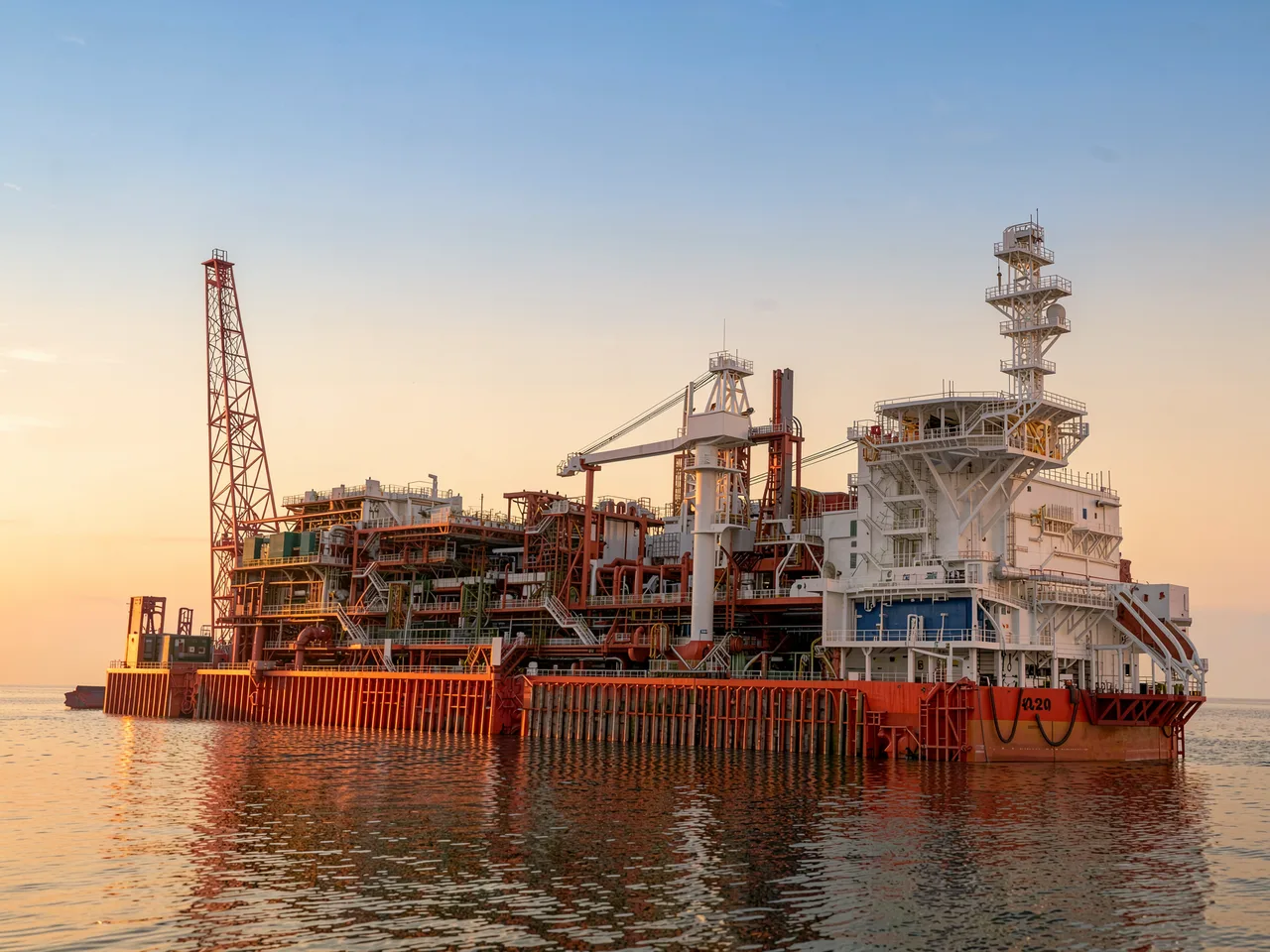An offshore FPSO floating production vessel at sunset — the kind of energy asset ABI Resources mobilises specialist crews to